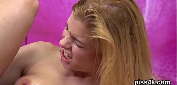  Sultry lezzie teens get splashed with piss and squirt wet pussies